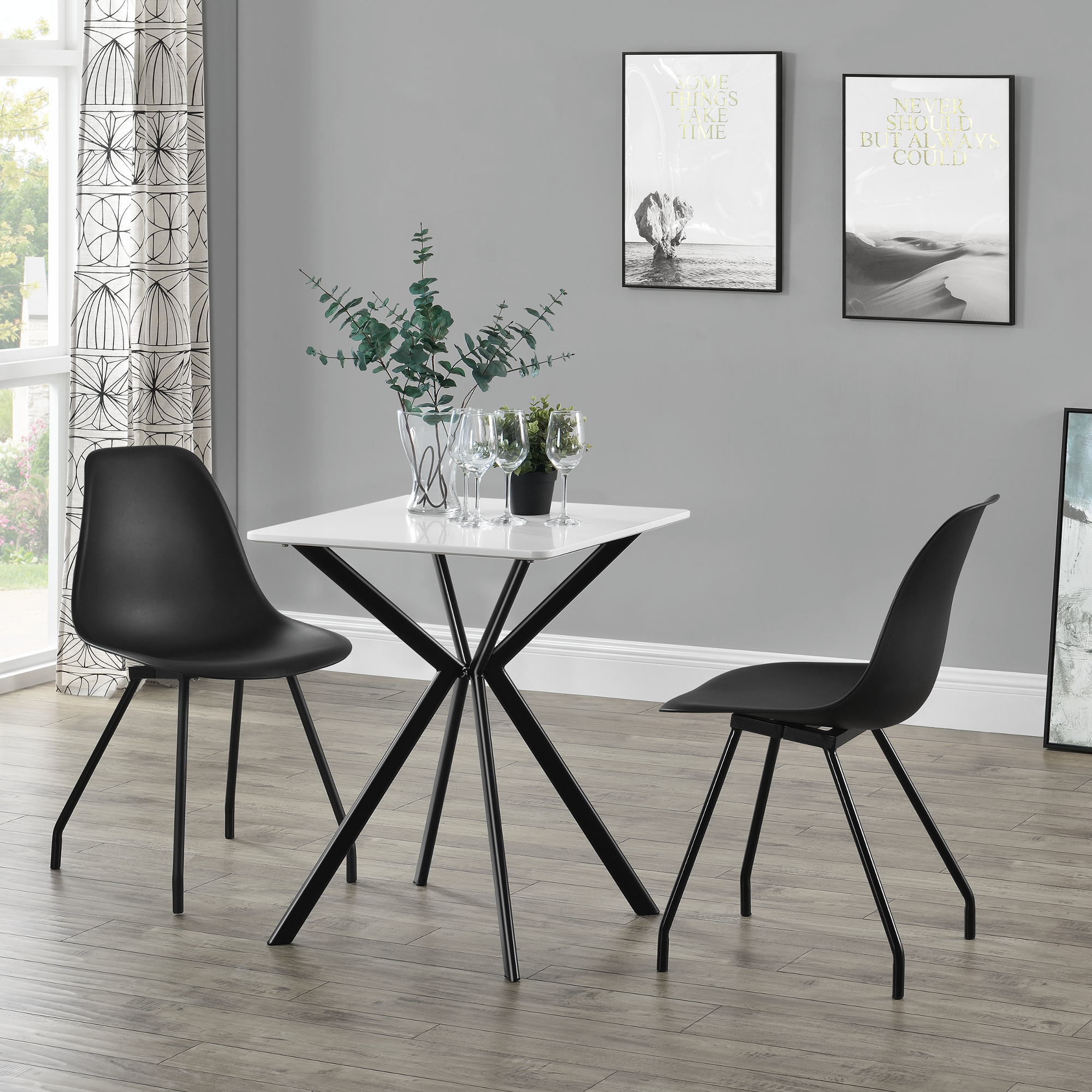 foto del prodotto tavolo da pranzo con piano quadrato 60 x 60 cm gambe di design in metallo bianco nero en.casa 
