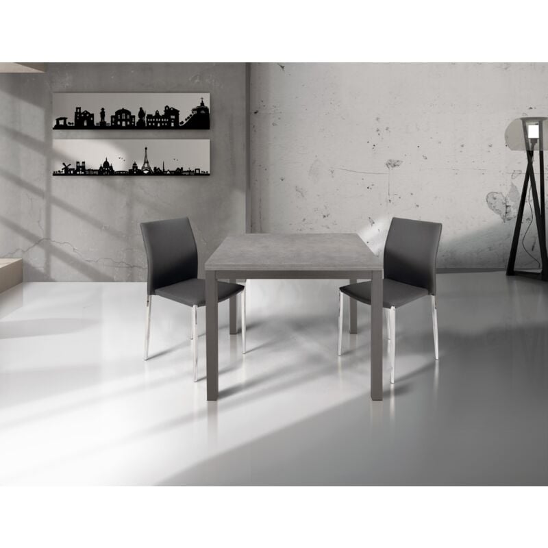 foto del prodotto tavolo quadrato 90x90 allungabile a 180 cm apribile a libro in finitura cemento