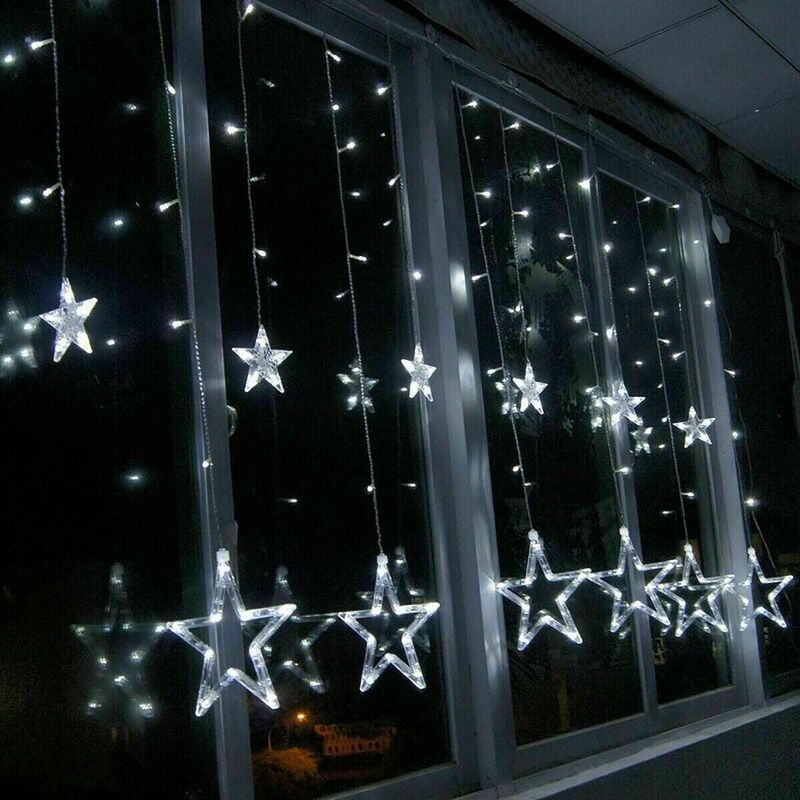 foto del prodotto tenda luminosa catena luci led di natale 10 stelle luce bianca fredda da interno