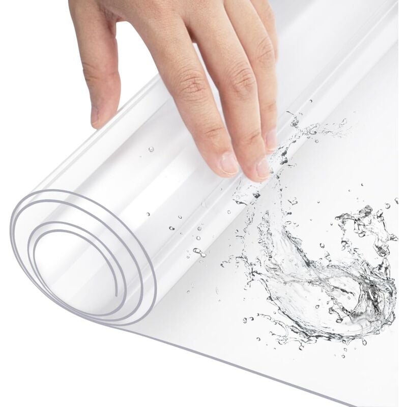 foto del prodotto tovaglia trasparente in pvc. spessore 1mm impermeabile antimacchia. copritavolo rettangolare moderno. pellicola protettiva per tavolo da pranzo e