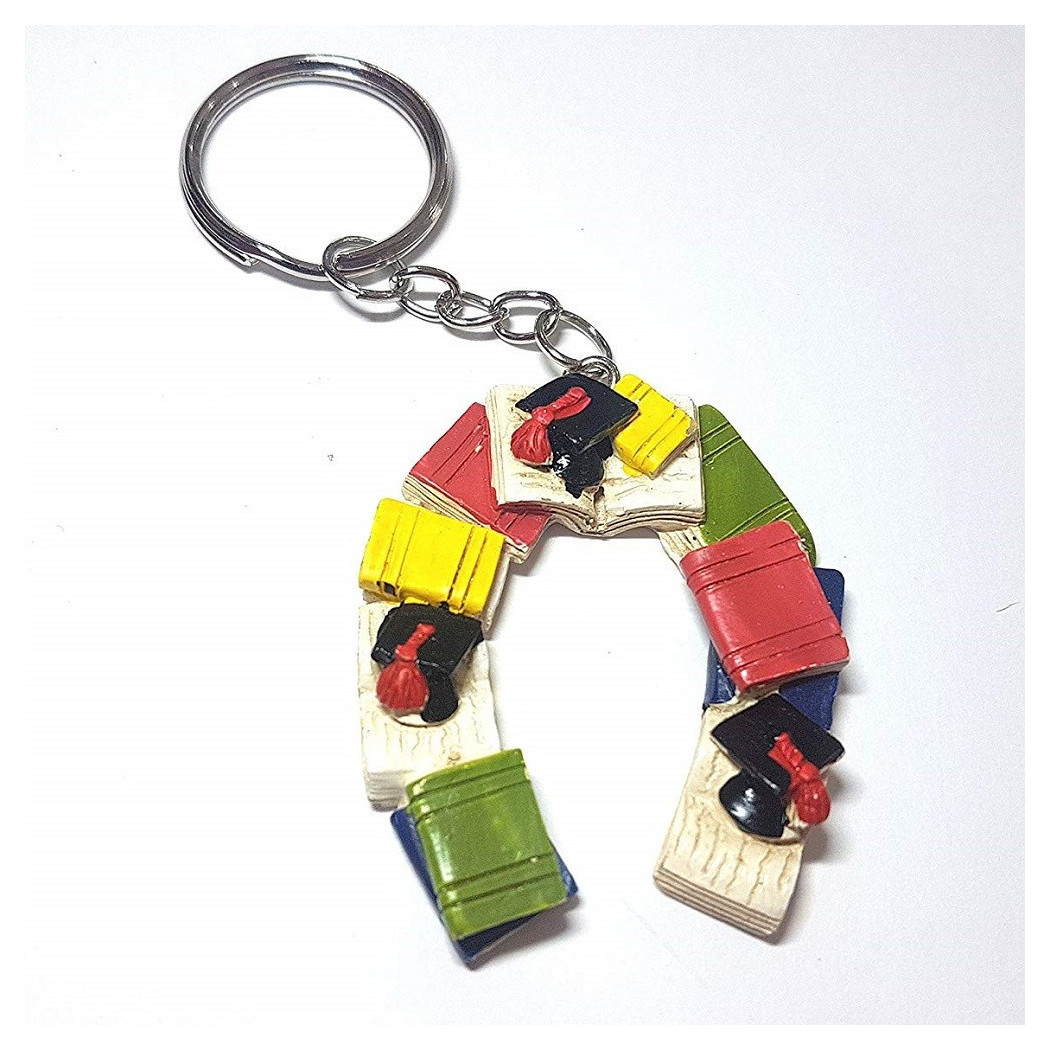 foto del prodotto trade shop set 12pz bomboniera ferro di cavallo laurea cappello libro fortuna ceramica portachiave 