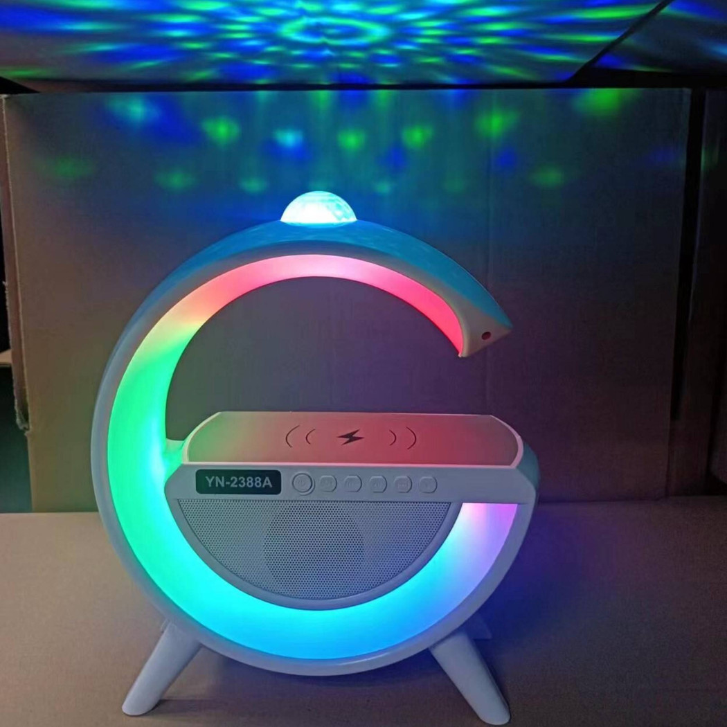 foto del prodotto trade shop traesio lampada led caricabatteria wireless cassa forma g con proiettore cielo stellato 