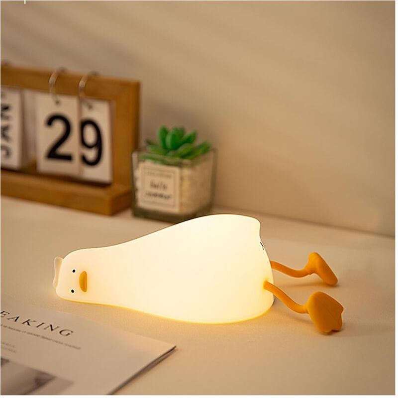foto del prodotto trade shop traesio luce notturna forma anatra sdraiata in silicone lampada ricaricabile usb a led touch 