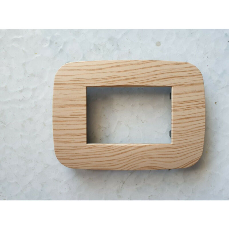 foto del prodotto trade shop traesio placca placchetta placchette compatibili per serie axolute bticino colorate fori legno chiaro 7 fori 