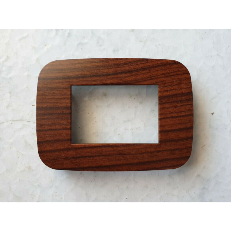 foto del prodotto trade shop traesio placca placchetta placchette compatibili per serie axolute bticino colorate fori legno scuro 7 fori 