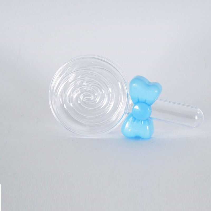 foto del prodotto trade shop traesio set 12 pezzi bomboniera bomboniere lecca lecca fiocco azzurro scatolina confetti 