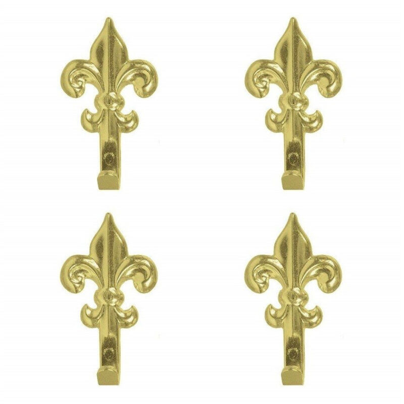 foto del prodotto trade shop traesio set 15 ganci oro 44mm appendino per quadro forma giglio fiorentino con chiodi 