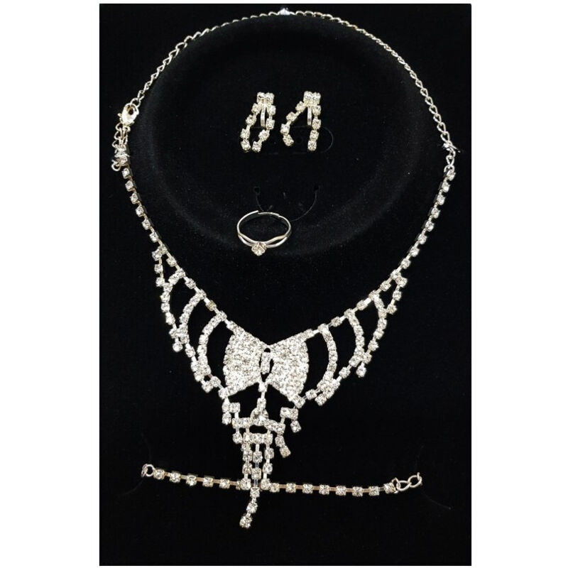 foto del prodotto trade shop traesio set completo parure collana fiocco orecchini bracciale anello strass bigiotteria 