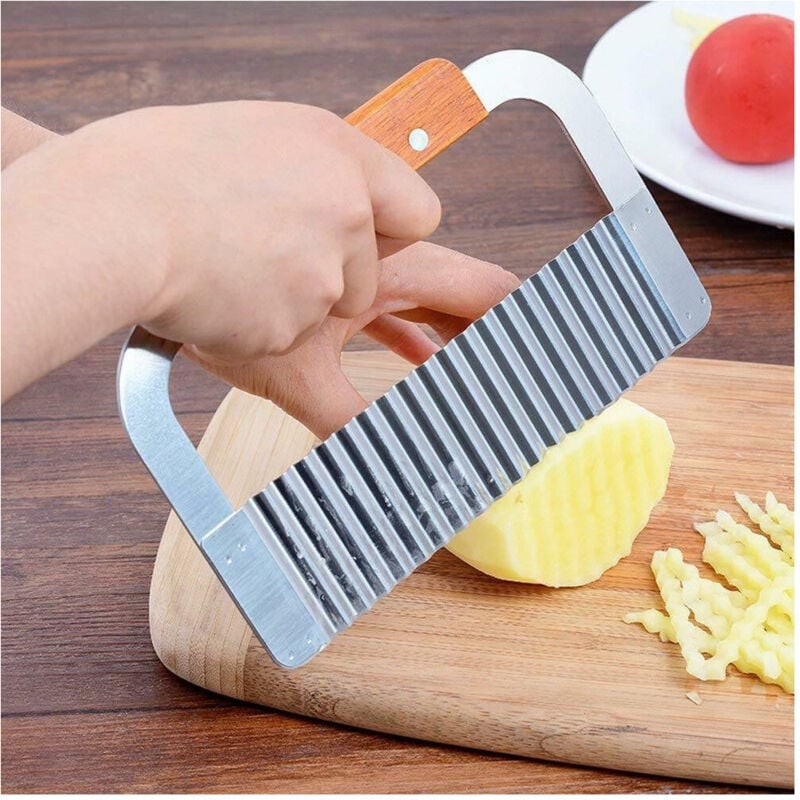 foto del prodotto trade shop traesio tagliapasta verdure spatola ondulata in acciaio inox con manico legno 