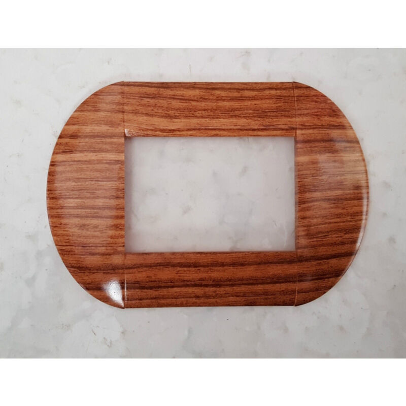 foto del prodotto traesio placca placche placchette compatibili living international light bombate bticino legno rovere 7 fori trade shop