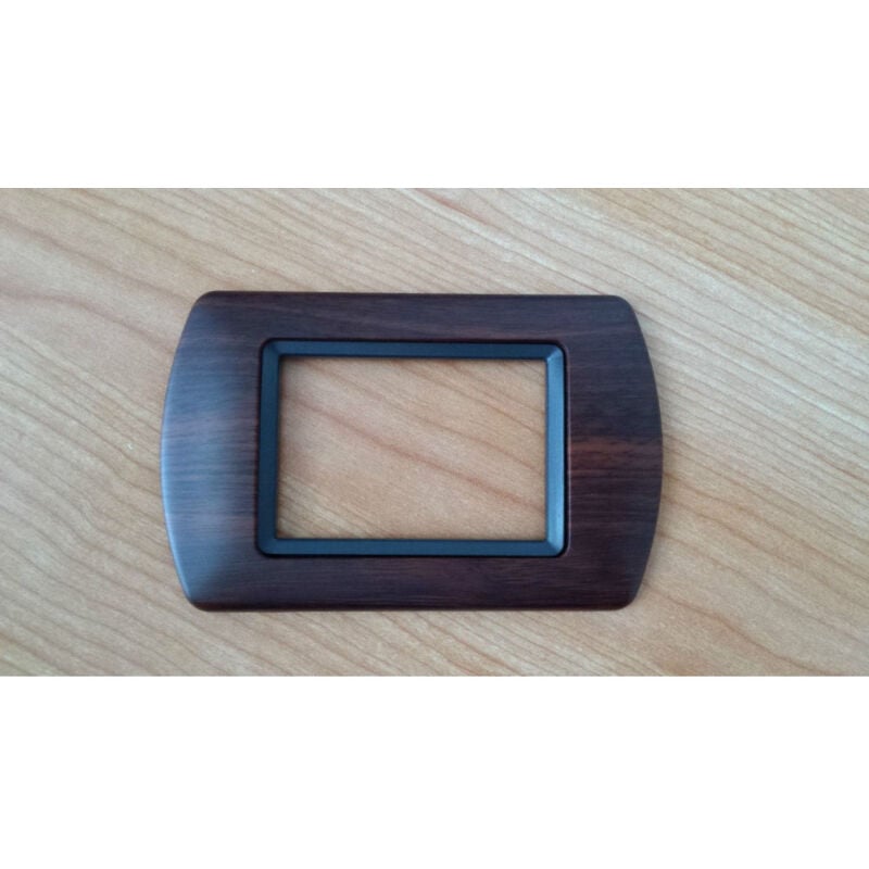 foto del prodotto traesio placchette placche in abs compatibili per serie living international placca legno scuro 4 fori trade shop