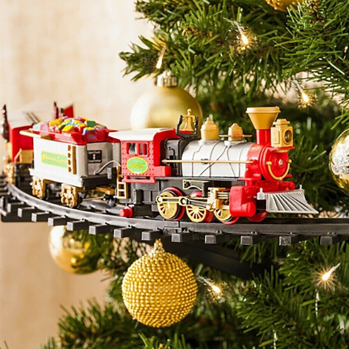 foto del prodotto trenino elettrico luci e suoni agganciabile all 39 albero di natale diametro 89 cm
