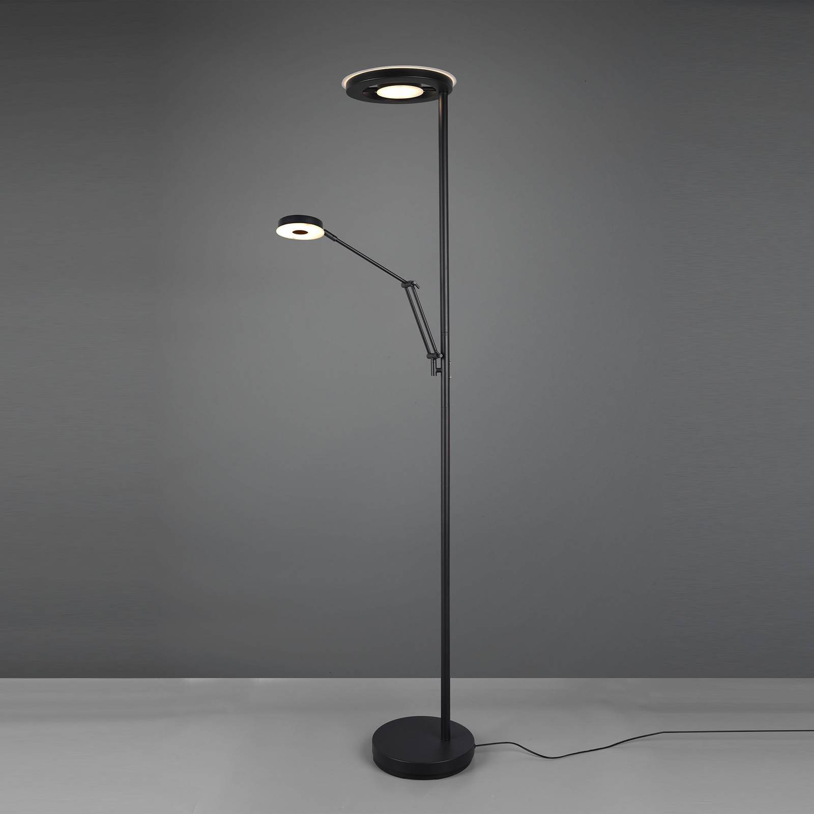 foto del prodotto trio lighting lampada a led da pavimento barrie con lampada da lettura nero opaco
