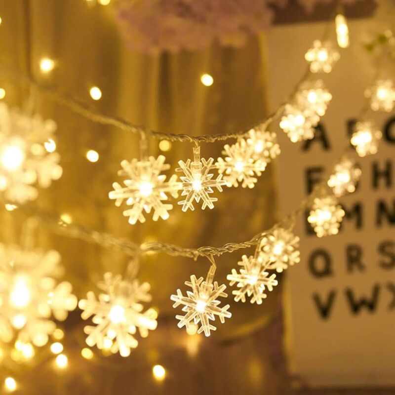 foto del prodotto ulisem stringa di luci a forma di fiocco di neve, 6m 40 luci a led alimentate a batteria, due modalit monocromatiche e decorazioni con fulmini