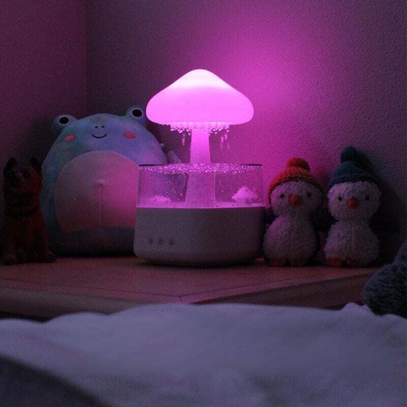 foto del prodotto umidificatore a nuvola di pioggia, diffusore di oli essenziali, simpatica luce notturna a forma di fungo con 7 cambi di colore, fontana da tavolo,