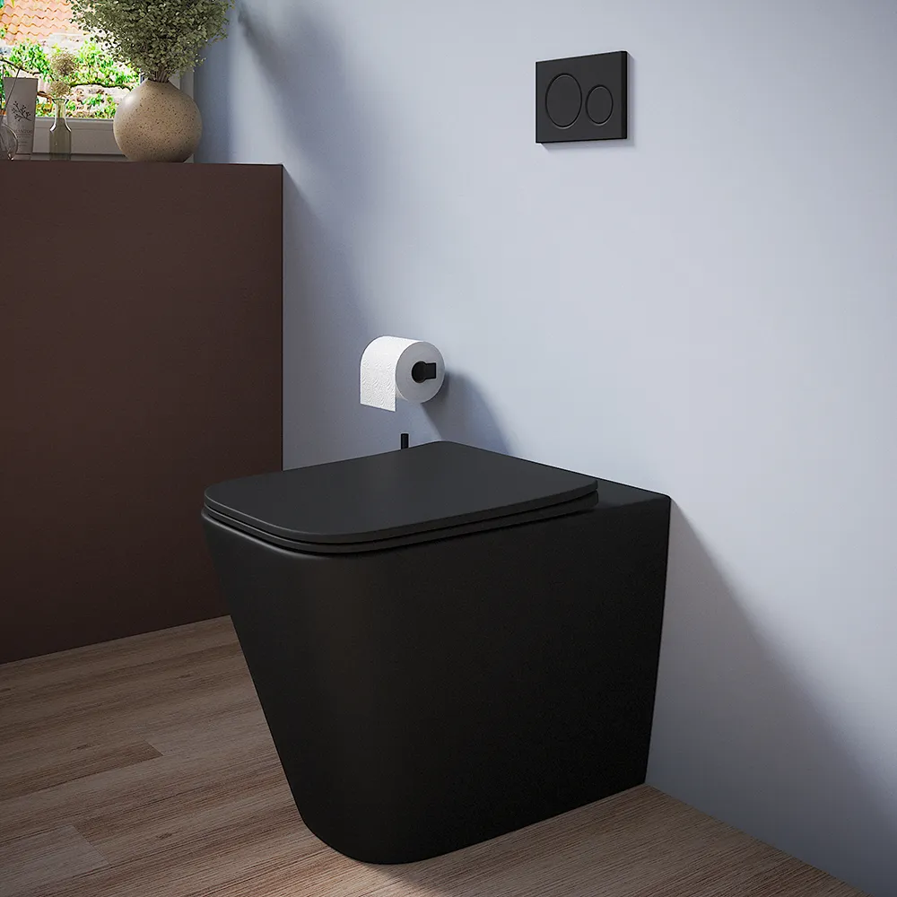 foto del prodotto vaso filomuro rimless in ceramica nero opaco con sedile soft close kyoto