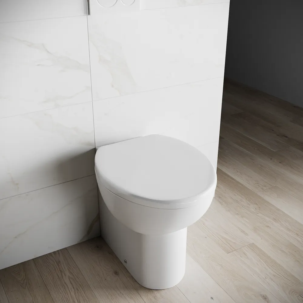 foto del prodotto vaso wc filomuro in ceramica bianco lucido con sedile soft close doha