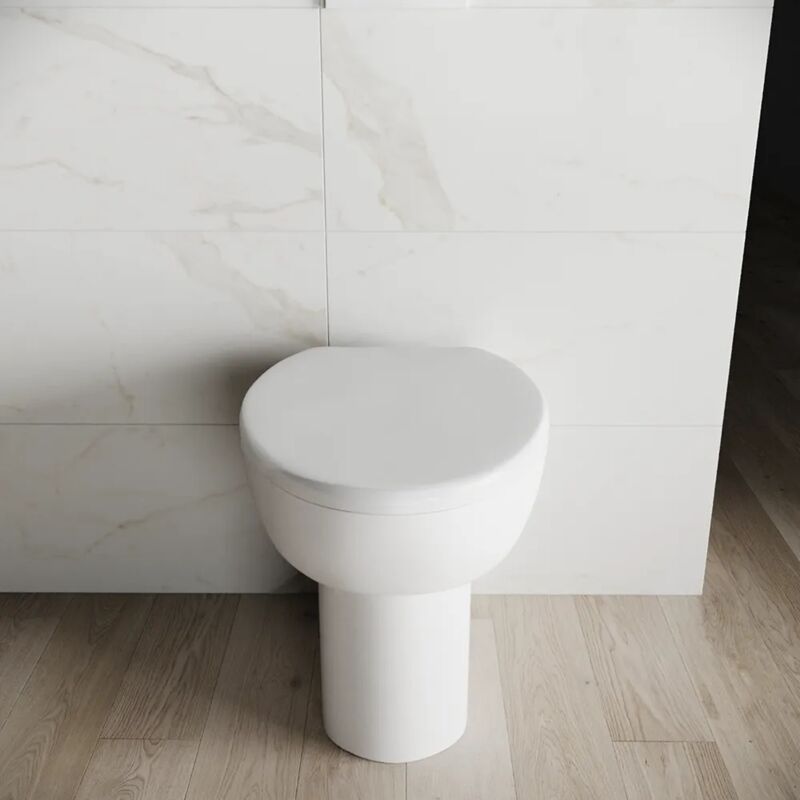 foto del prodotto vaso wc filomuro in ceramica bianco lucido con sedile soft-close mod. doha