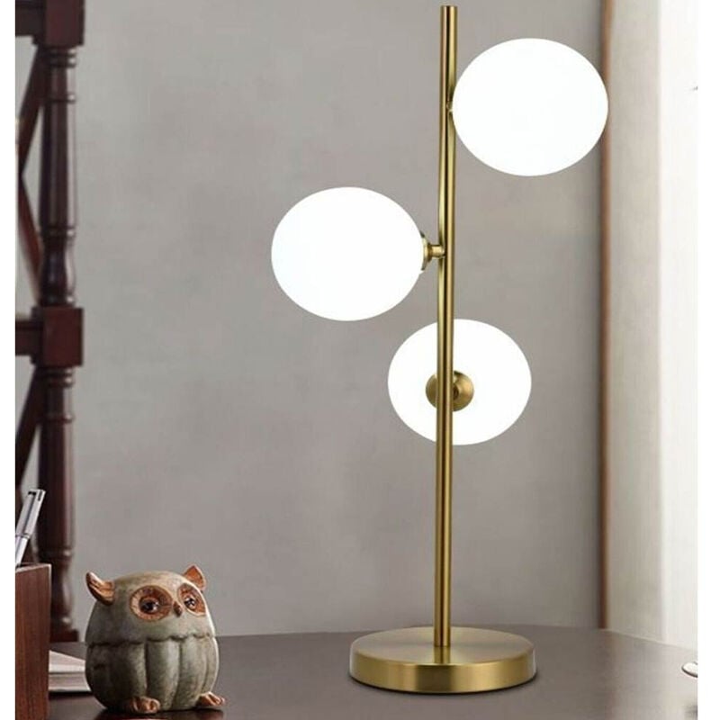 foto del prodotto vetrineinrete lampada da tavolo minimalista bronzo con 3 sfere piantana da terra con stelo per soggiorno open space
