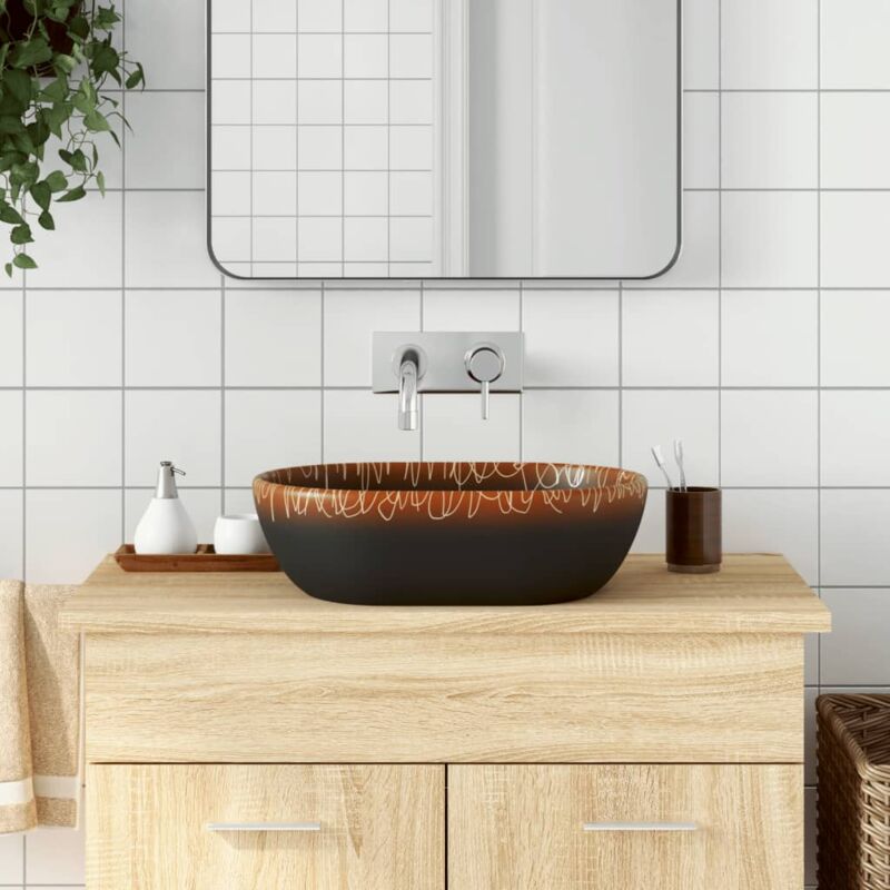 foto del prodotto vidaxl lavabo da appoggio nero e arancione ovale 47x33x13 cm ceramica