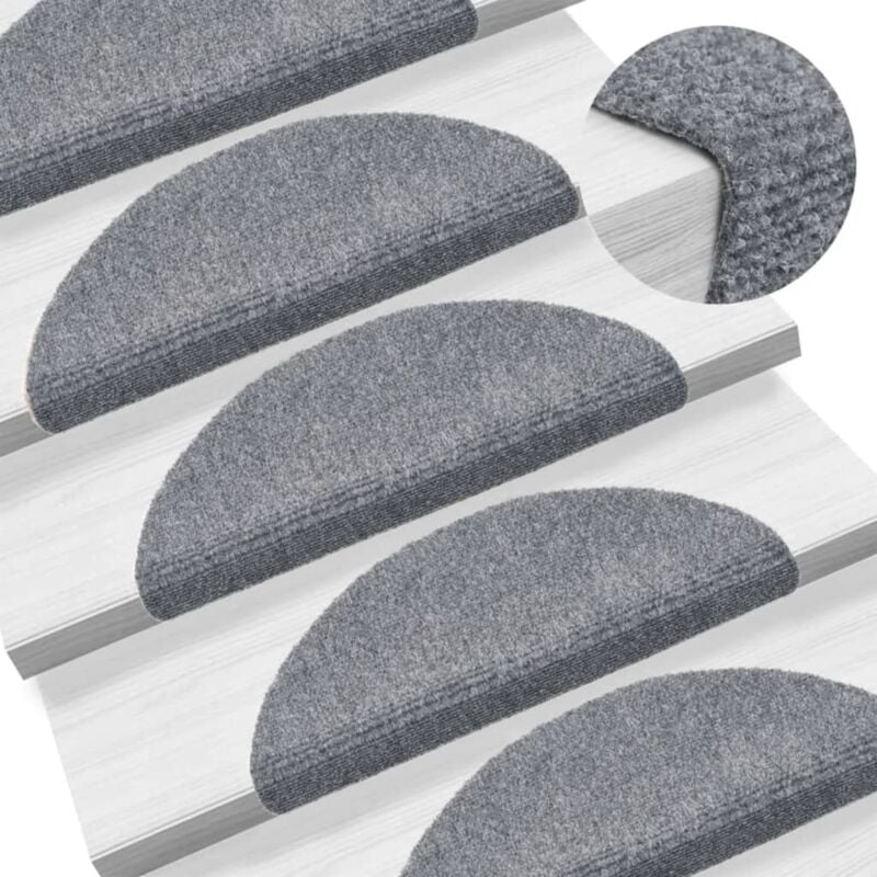 foto del prodotto vidaxl tappetini autoadesivi per scale 15 pz 56x17x3 cm grigio chiaro