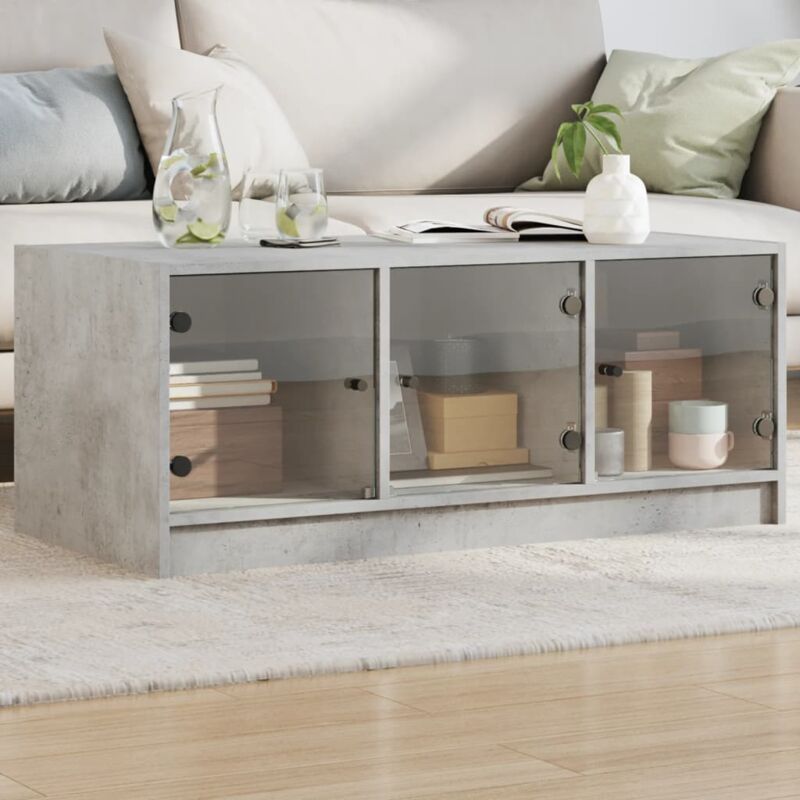 foto del prodotto vidaxl tavolino salotto con ante in vetro grigio cemento 102x50x42 cm